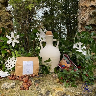 clay water filer living water eco gift set with soapnuts on wall with snowflakes