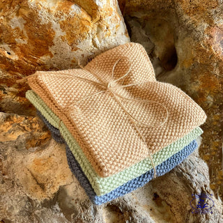 cotton dish cloths a set of three on rocks