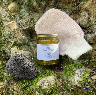 exfoliating kit on mossy wall