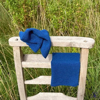 indigo-dish-cloths-on-chair-by-pond