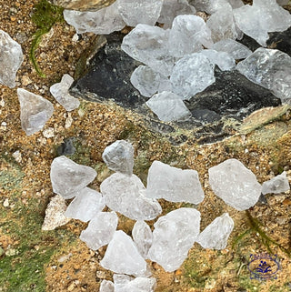 alum pebbles on sand
