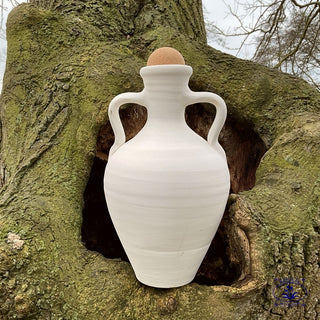white amphora on tree